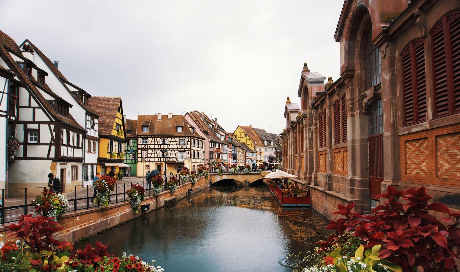A canal in Colmar with frost on the timbered houses