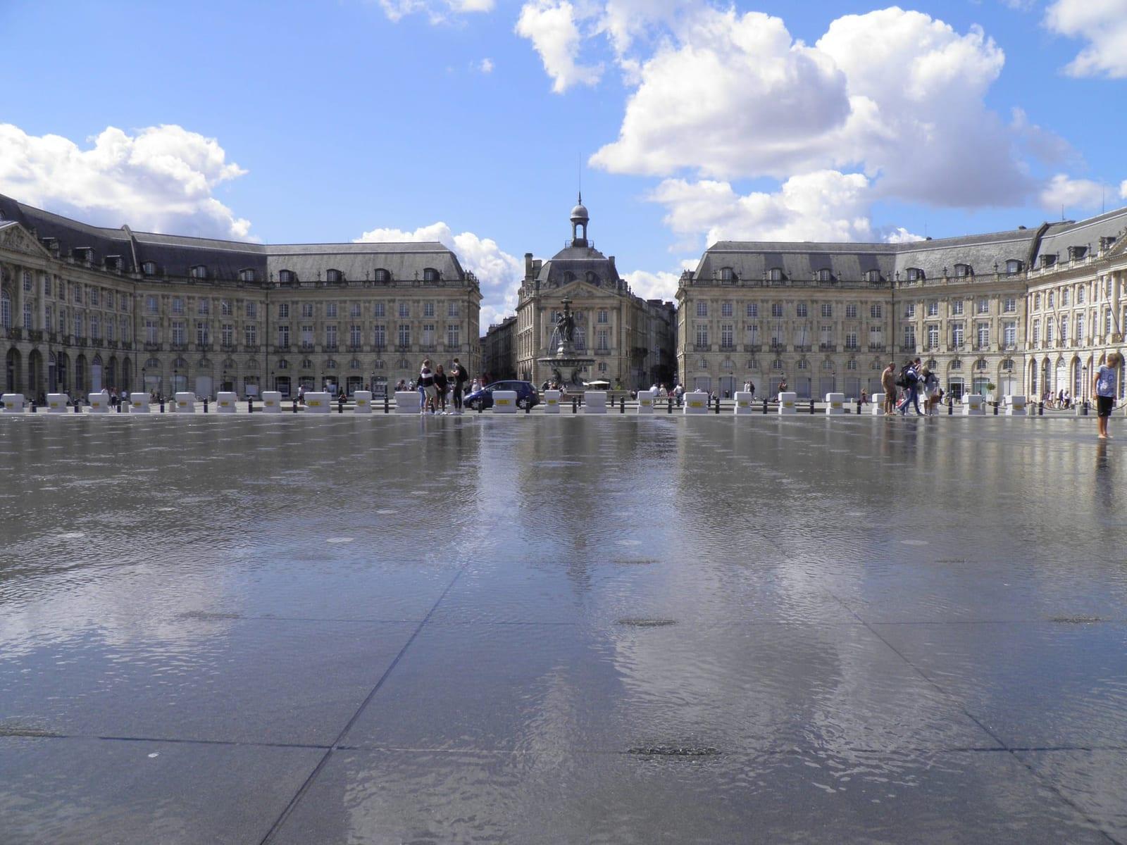 The water mirror in front of the facade of the place de la Bourse