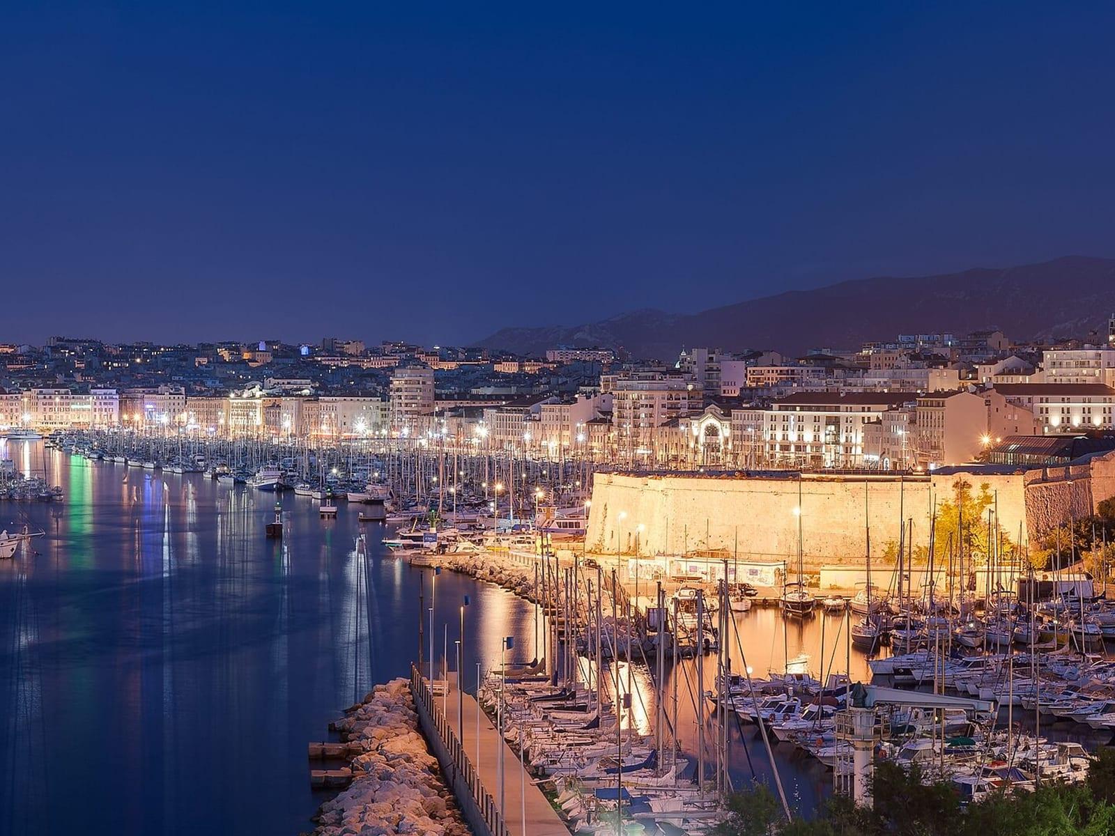 The old port of Marseille lit after dark