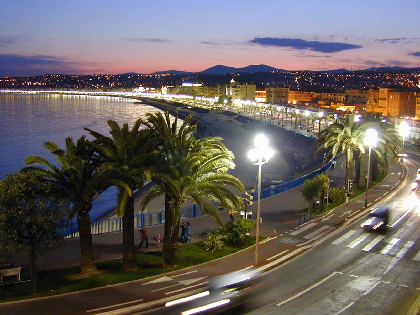 Palm trees along the Promenade des Anglais at the end of the day